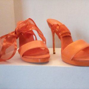 Fabulous satin lace up Size 7 pumps. Gold metallic heel satin lace ups.